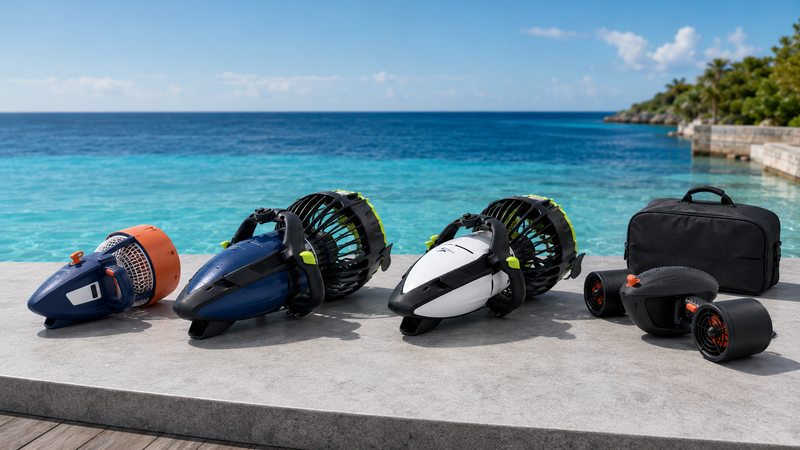 Nautica Recreational, Marine, Navtech and J-Class sea scooters displayed together beside the water.