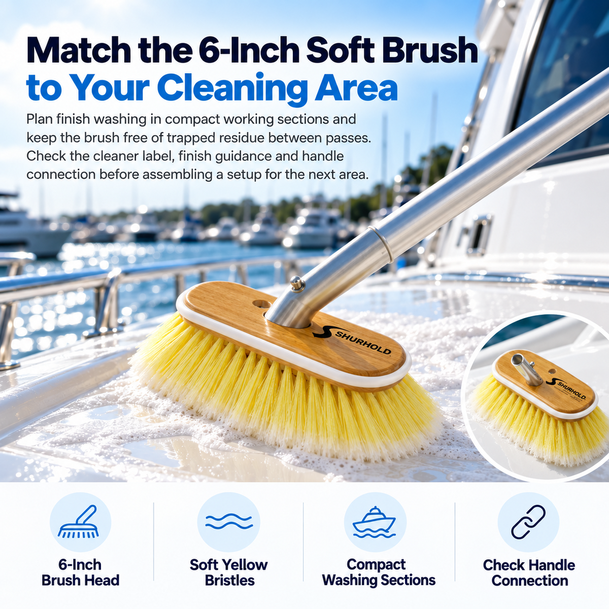 Shurhold 960 6-inch soft deck brush with yellow bristles and a wooden head washing a soapy white yacht deck.