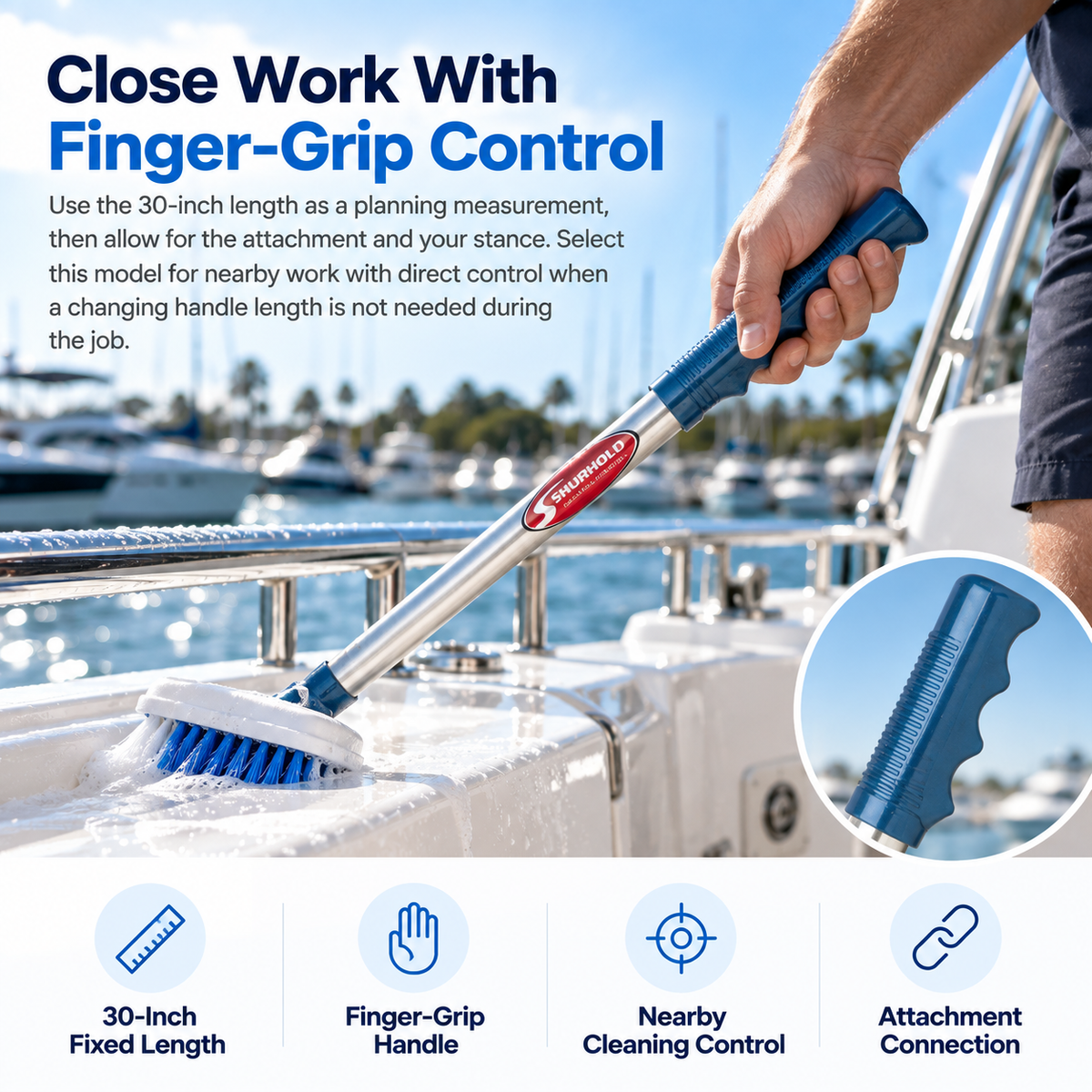 Shurhold 730FG 30-inch fixed-length handle with blue finger grips used with a brush to clean a white boat surface.